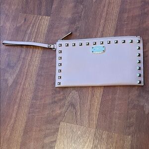 Like new Michael Kors Blush Wristlet Clutch with Stud Accents
